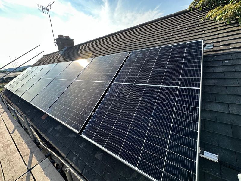 3.6kW solar panel array on a tiled roof in Neath, installed by EJS Electrical and Renewables